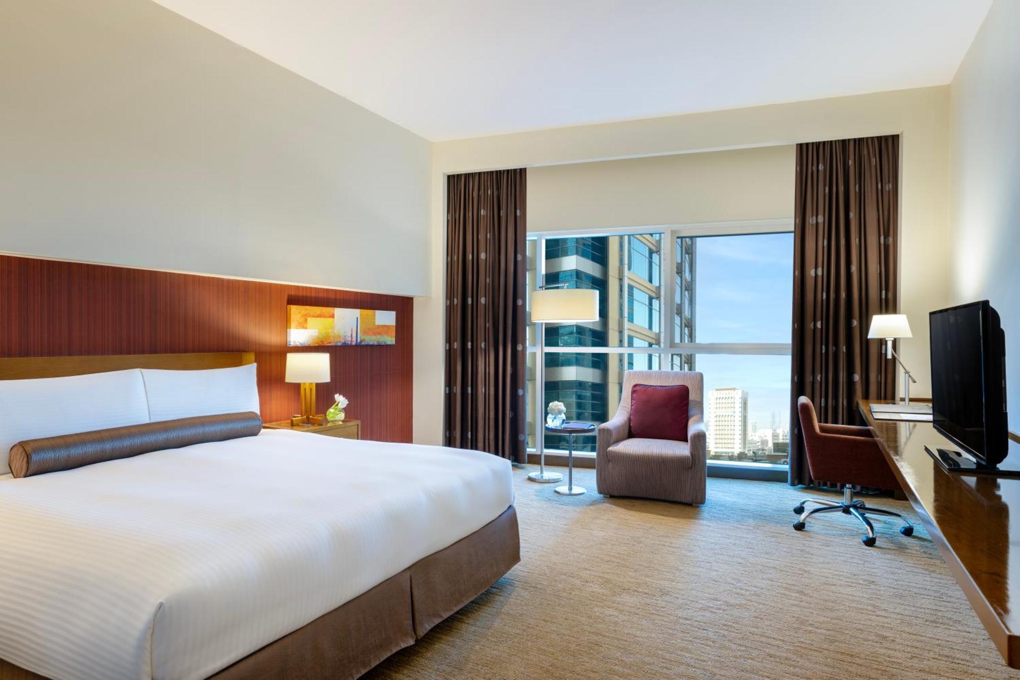 Отель Grand Millennium Al Wahda And Executive